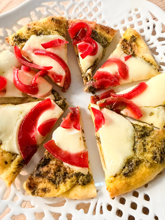 Mini pesto flatbreads with pickled onions & mozzarella